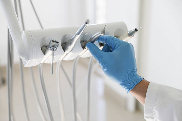 Professional Tooth Extraction technician working in Zebulon, NC